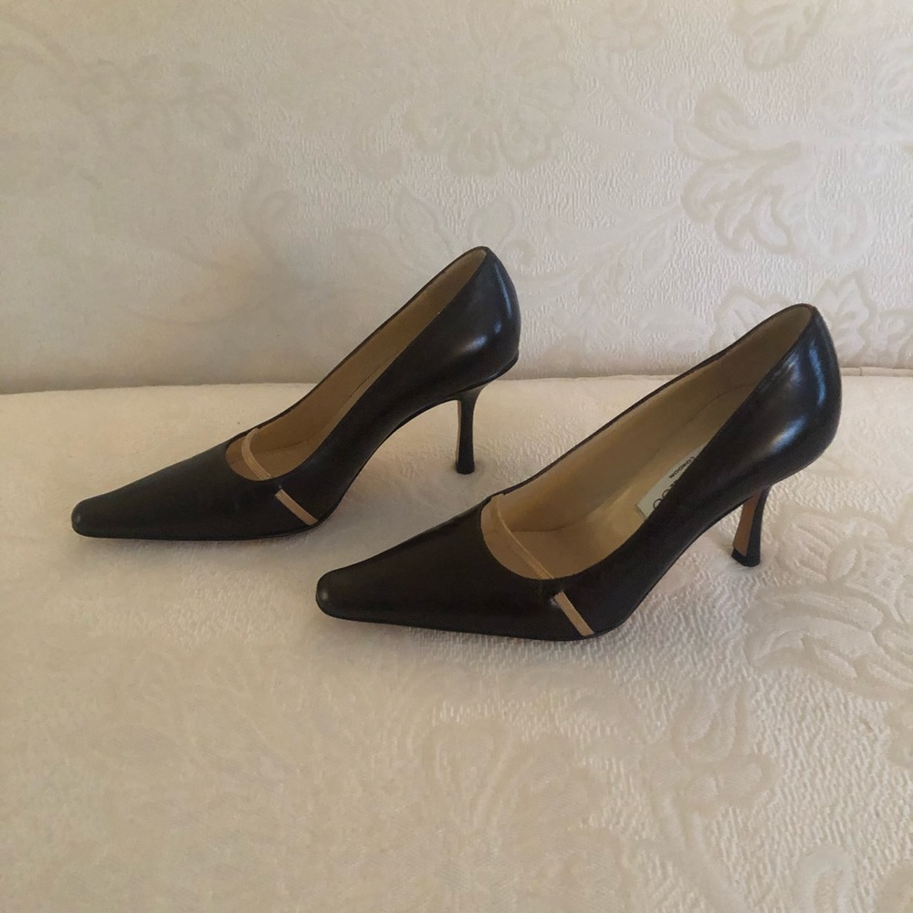 Jimmy Choo Brown Leather Pumps with a Tan accent strap.